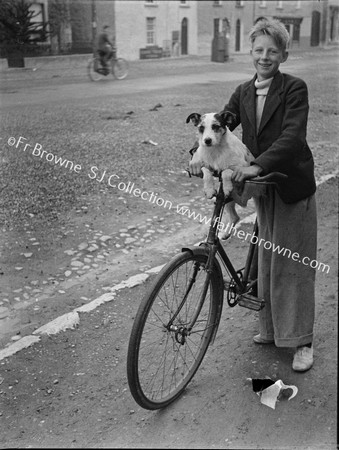 BOY WITH DOG ON BIKE